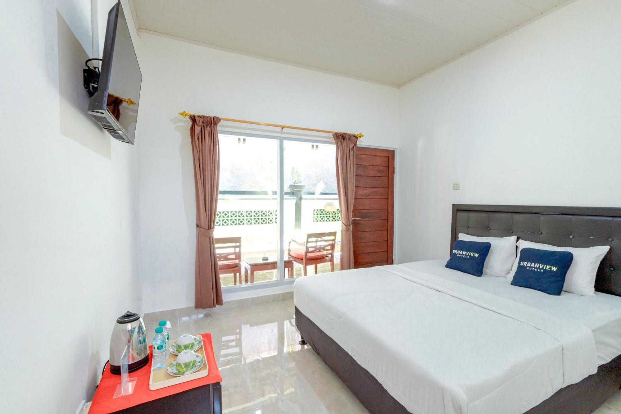OYO 2548 Rasa Sayang Inn Kuta Selatan Luaran gambar