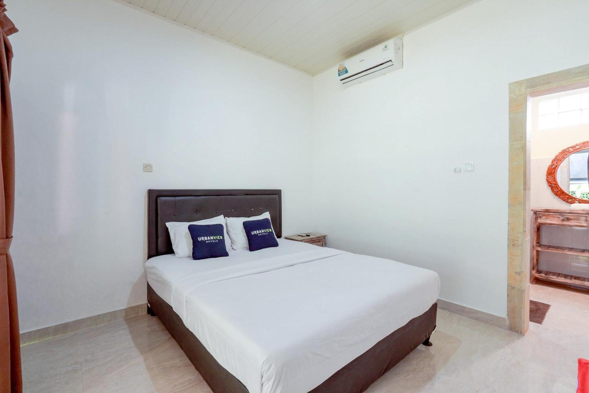 OYO 2548 Rasa Sayang Inn Kuta Selatan Luaran gambar
