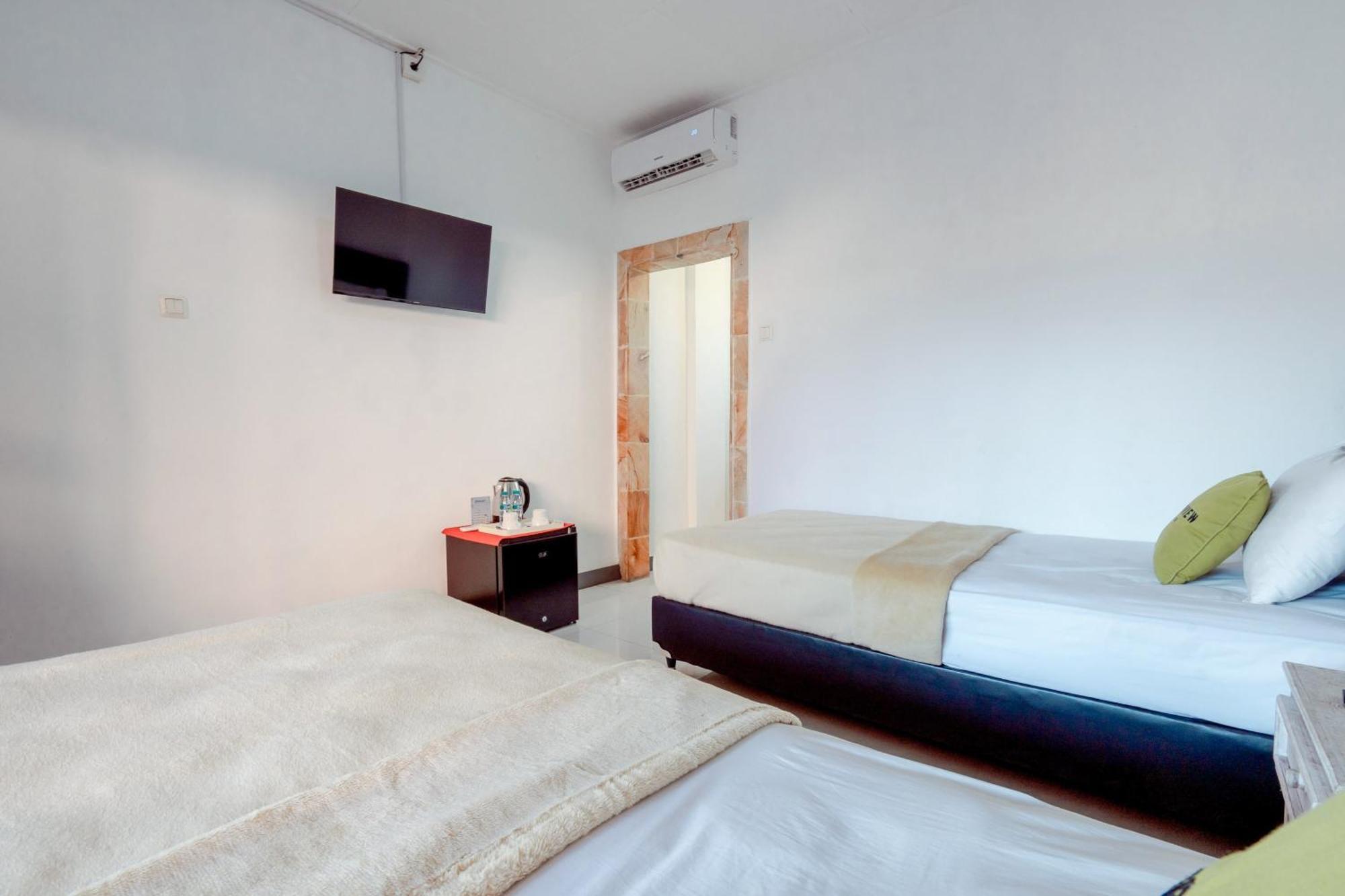 OYO 2548 Rasa Sayang Inn Kuta Selatan Luaran gambar