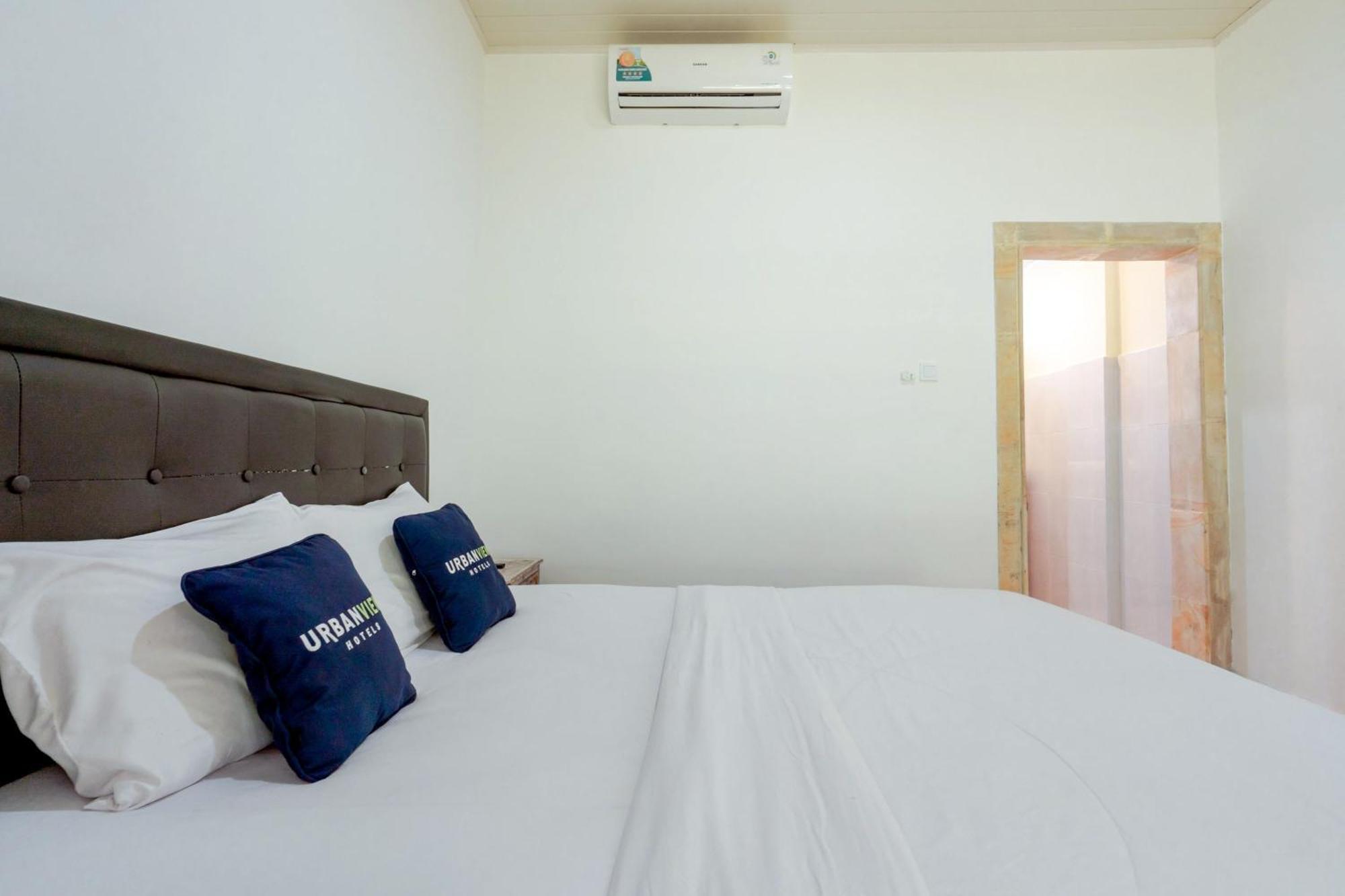 OYO 2548 Rasa Sayang Inn Kuta Selatan Luaran gambar