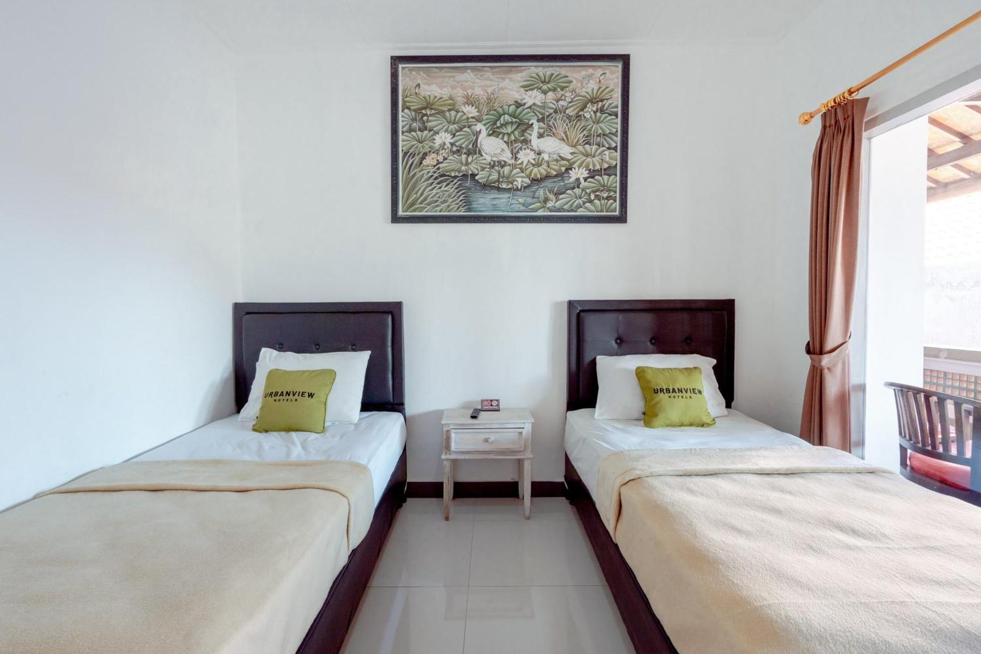 OYO 2548 Rasa Sayang Inn Kuta Selatan Luaran gambar